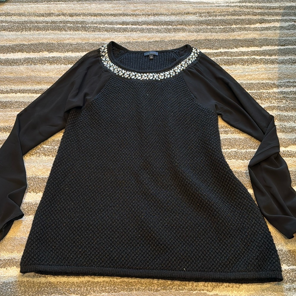 Black sweater with jeweled neckline